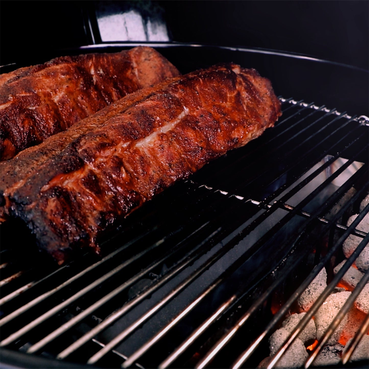 SnS Grills FireBaskets and Water Wall smoking ribs in a kettle, offset kettle bbq smoking