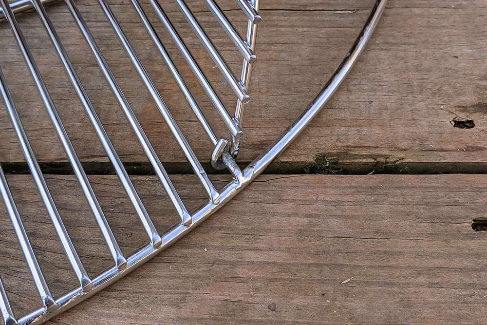 
                  
                    Designed to match the width of the Slow 'N Sear® XL, the single opening streamlines grate functionality while making it easier to access fuel in the basket. Two-zone cooking enthusiasts and Cold Grate Technique lovers rejoice! Made from high quality 304 stainless steel, this grate will simplify and elevate any cook.  | SnS Grills
                  
                