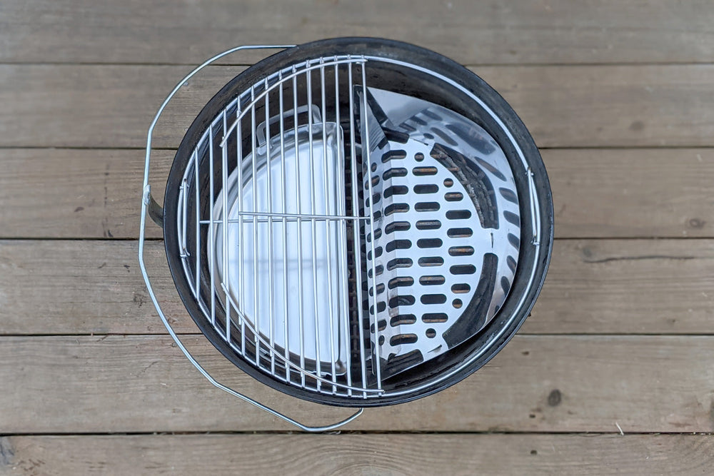 
                  
                    Bundle & Save! Get this ULTIMATE Slow ‘N Sear® Mini Platinum Bundle for your 18″ kettle! This package includes 3 products: Slow ‘N Sear® Charcoal Basket, Mini Drip Pan and EasySpin™ Grill Grate - 18".
                  
                