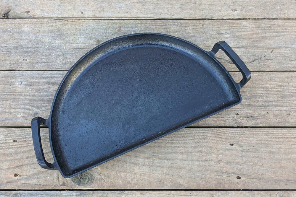 3-in-1 Grill Accessory - in Cast Iron! This cast iron Drip 'N Griddle Pan has the same three functions many of you know and love about our other pans, but now made in cast iron. That means you get a non-stick surface, a perfect companion for searing up a ribeye and no more warping over direct high heat!