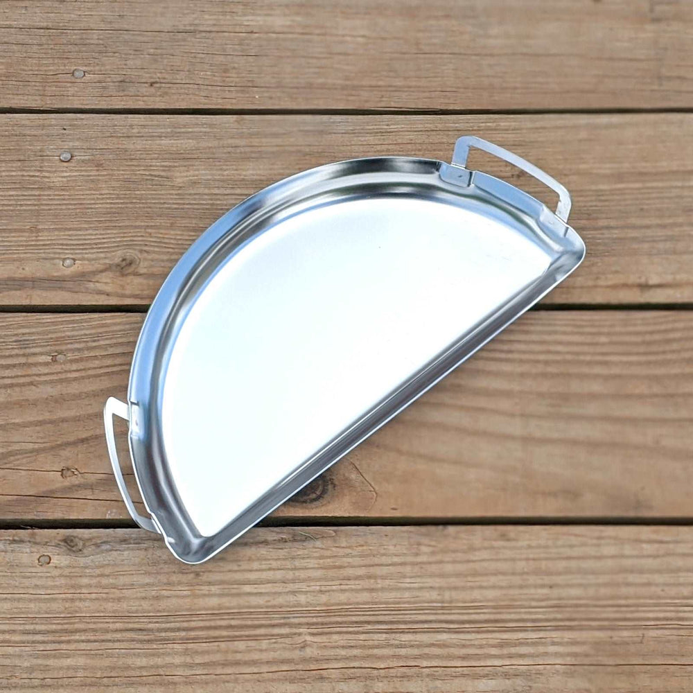
                  
                    This Mini Drip Pan offers everything you love about our Drip 'N Griddle Pan but in a mini size! It features sleek, streamlined edges and exterior welded handles. The size is easily held with one hand for everyday use.
                  
                