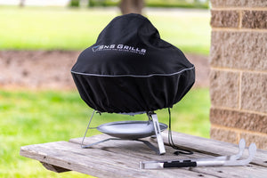 Branded Cover for our Travel Kettle Grill We know there’s nothing better than looking at the beauty of the Slow ‘N Sear® Travel Kettle Grill. But when it needs some additional protection from the elements, this “SnS Grills” branded cover is the ideal solution!